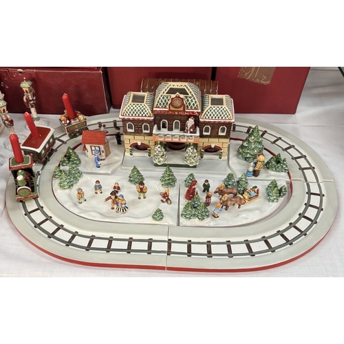 215 - A quantity of Villeroy & Boch Christmas track & train set & extras (most in boxes), 1 train A/F has ... 