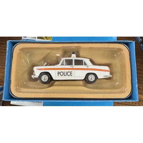 217 - 17 boxed Vanguards die cast police vehicles