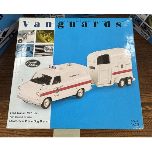 217 - 17 boxed Vanguards die cast police vehicles