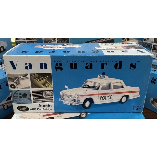 217 - 17 boxed Vanguards die cast police vehicles