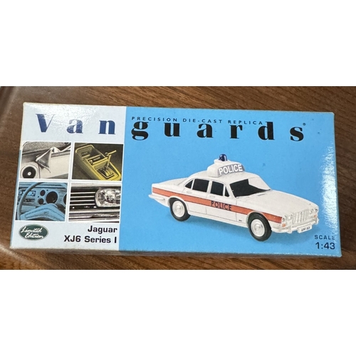 217 - 17 boxed Vanguards die cast police vehicles