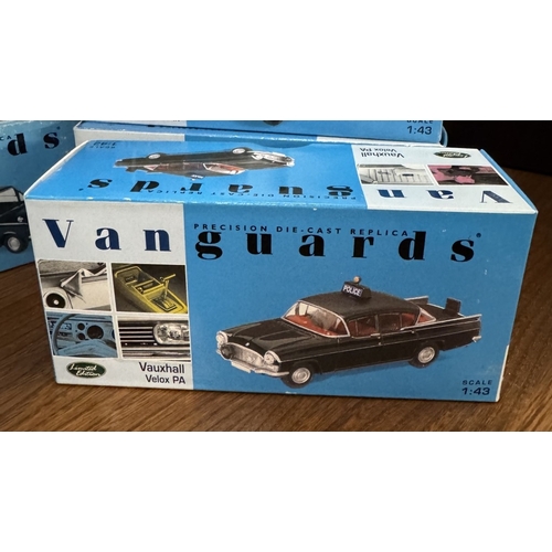 217 - 17 boxed Vanguards die cast police vehicles