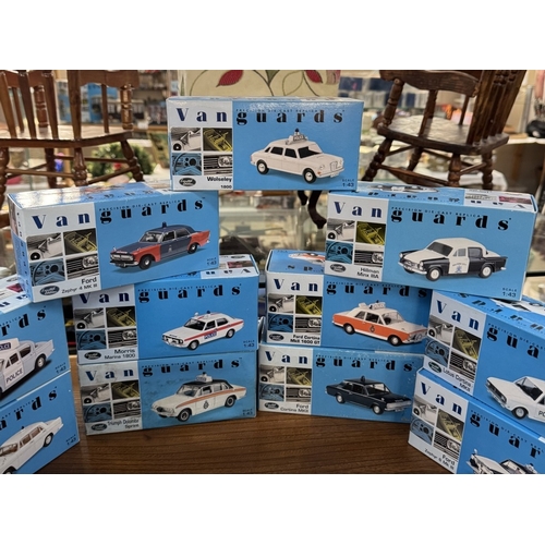 217 - 17 boxed Vanguards die cast police vehicles