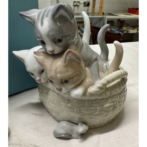 1374 - A boxed Lladro kitten in basket & another unboxed