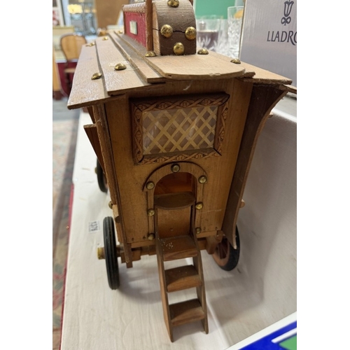 1376 - A large scratch built wooden model of a Gypsy caravan moulded as a money box