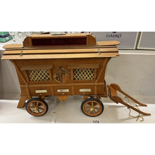 1376 - A large scratch built wooden model of a Gypsy caravan moulded as a money box