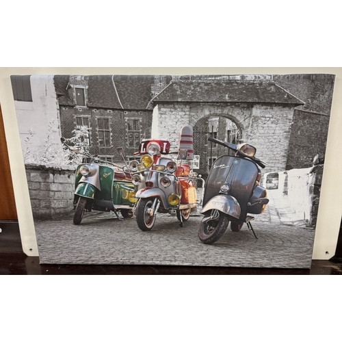 229 - 10 retro scooter, Mod prints on canvas including Quadrophenia, Sting, Lambretta & Vespa, various siz... 