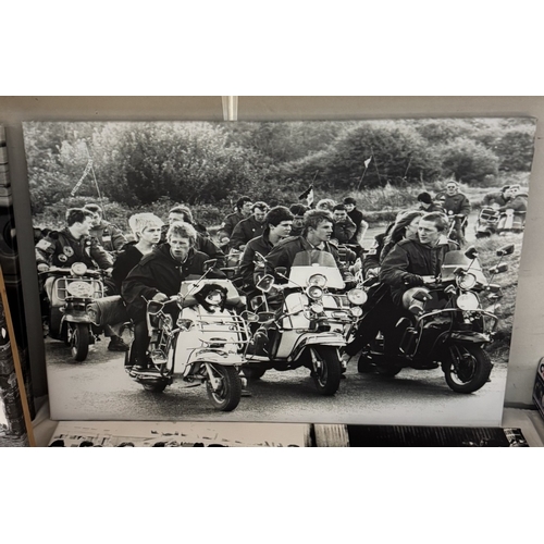 229 - 10 retro scooter, Mod prints on canvas including Quadrophenia, Sting, Lambretta & Vespa, various siz... 