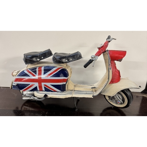 230 - 3 large pressed steel models of Lambretta/Vespa Mod scooters. Length 33cm