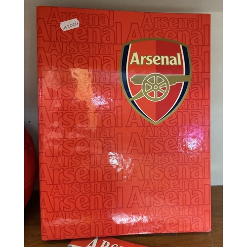 235 - A selection of Arsenal football merchandise