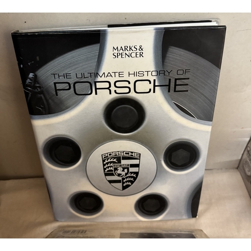 244 - A quantity of good reference books on classic Porche cars including Land Rover & Range Rover & Route... 