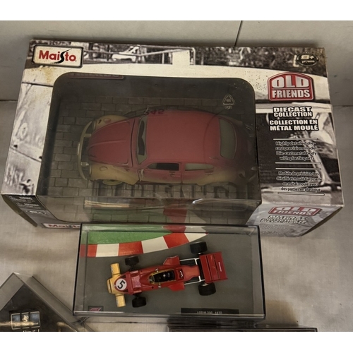 245 - A selection of boxed die cast including Vitesse Riley Elf, Formular 1 & Maisto old friends Volkswage... 