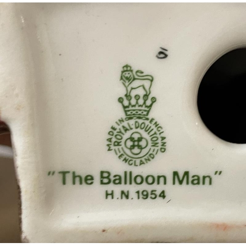 1084 - A Royal Doulton figurine - The Balloon Man, HN1954