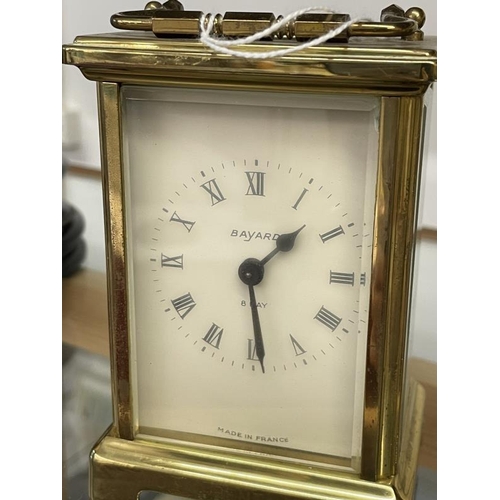 1099 - A Bayard brass carriage clock engraved on front 'Volvo Penta UK'.