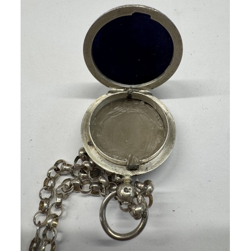 1173 - A quantity of silver items to include 2 napkin rings, a silver locket & chain & silver crucifix & ch... 