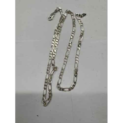 1174 - A quantity of silver items to include chains & charm bracelet with some silver charms