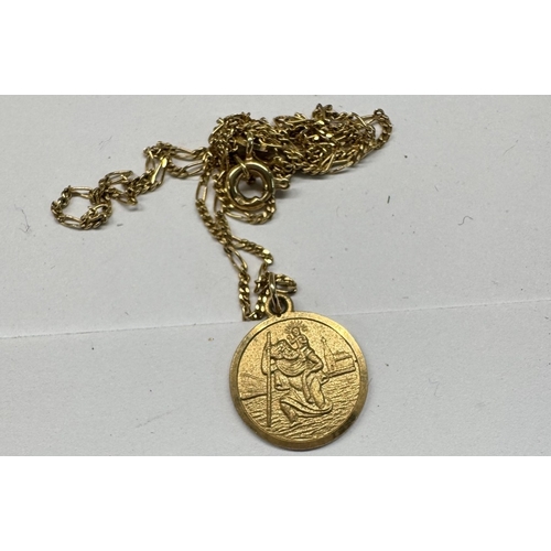 1179 - Approximately 11.17gms of 9ct gold to include 9ct gold crucifix & chain 3.8gms,9ct gold horse shoe 1... 