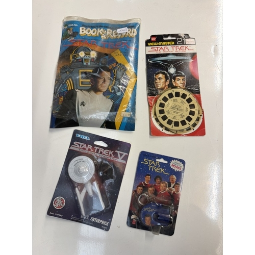 288 - A quantity of Star Trek movie merchandise including movie cards, mini figures, Corgi Juniors etc