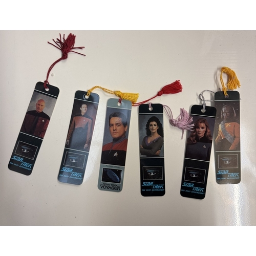 289 - A quantity of Star Trek Next Generation merchandise including boxed & unboxed figures, pictures, a l... 