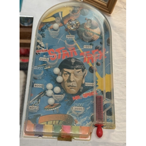 297 - An original Star Trek toy pinball machine, a Spock puzzle, 2 posters, mirrors & clock