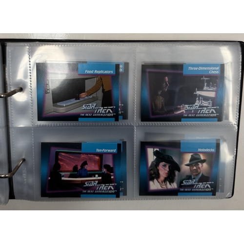 302 - An album of Star Trek cards in an unopened box of Panini Star Trek NG stickers & an opened box of St... 