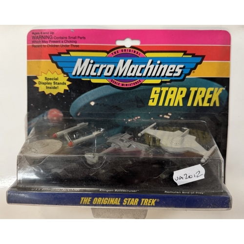 310 - 3 unopened Star Trek micromachine buster packs each with 3 different spaceships