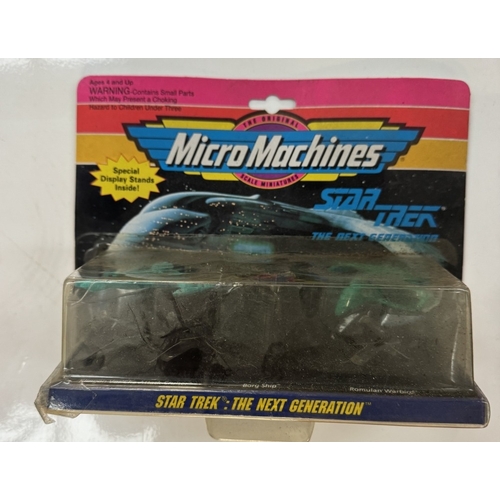 310 - 3 unopened Star Trek micromachine buster packs each with 3 different spaceships