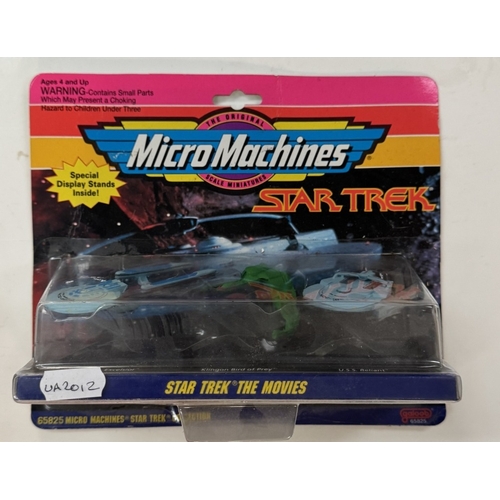 310 - 3 unopened Star Trek micromachine buster packs each with 3 different spaceships