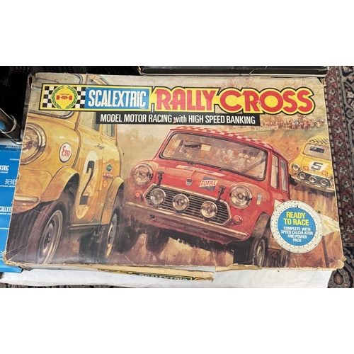 322 - A boxed Scalextric Rally Cross set with cars, a quantity of Scalextric boxed cars & a quantity of ex... 