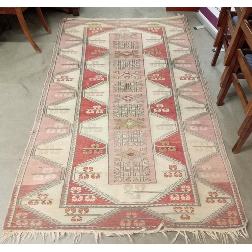 1396 - A Turkish rug - 214cm x 130cm COLLECT ONLY