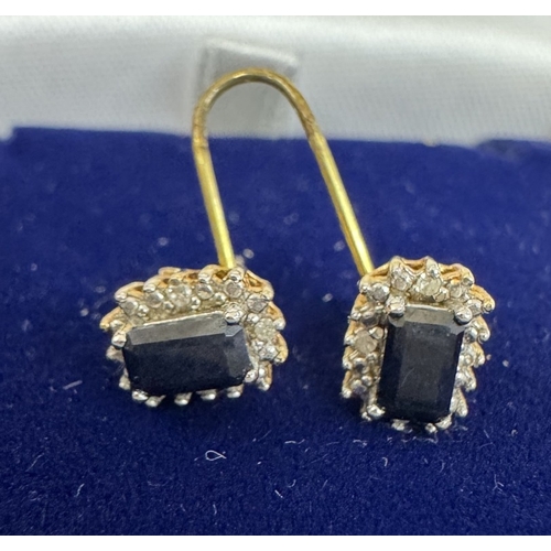 1193 - A pair of 9ct gold diamond & sapphire earrings