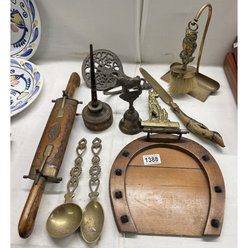 1388 - A quantity of miscellaneous brass etc. including horse bell, Alsatian wolf dog, door knocker, oak cr... 