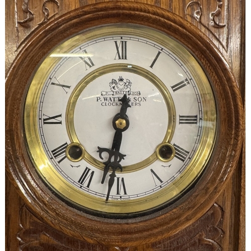 1403 - A small oak wall clock by P Watts & Sons, clockmakers. COLLECT ONLY