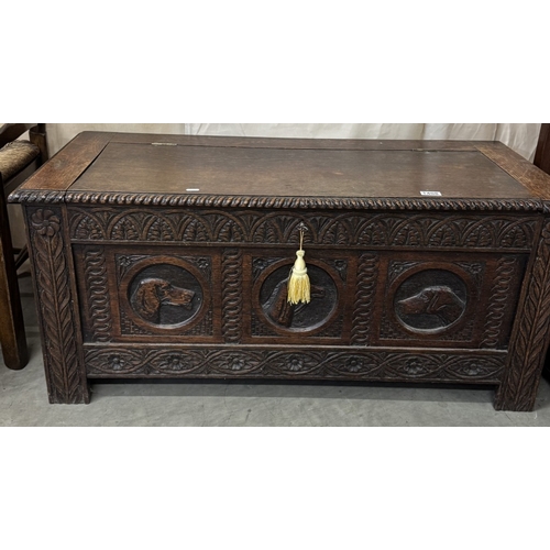 1408 - A 19th/20th century coffer/blanket box carved with horse & dogs heads - 113cm x 50cm x 50cm COLLECT ... 