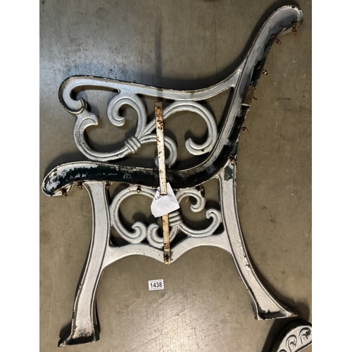 1438 - A pair of cast iron garden bench ends. COLLECT ONLY.