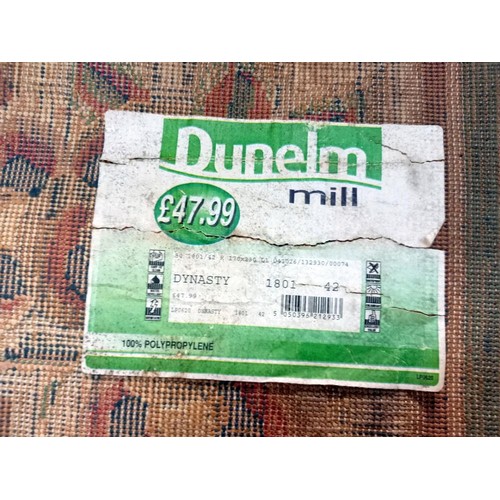 359 - A green patterned rug from Dunelm Mill - 170cm x 230cm COLLECT ONLY.