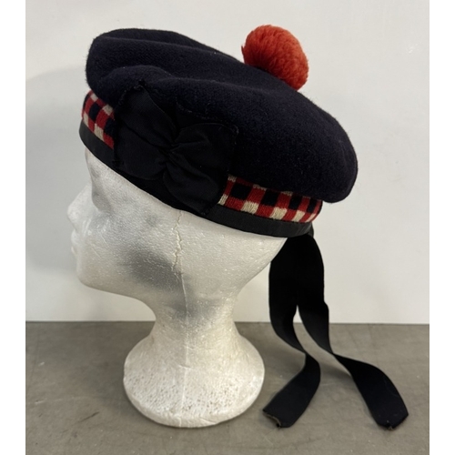 348 - A Scottish tartan Balmoral bonnet pipe band hat