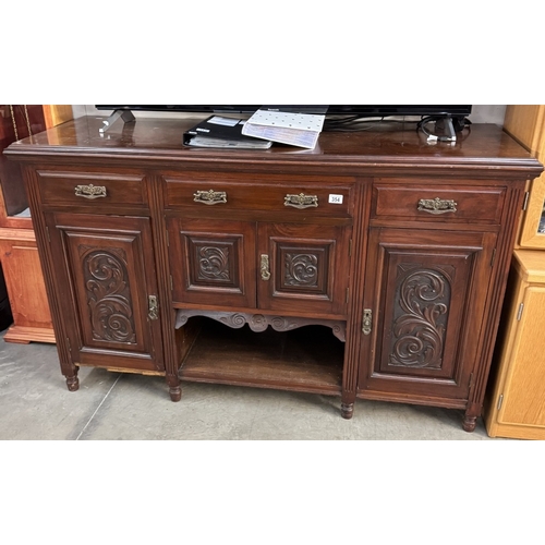 354 - A mahogany sideboard with carved floral panels, 158cm x 52cm x 94cm COLLECT ONLY.