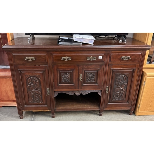 354 - A mahogany sideboard with carved floral panels, 158cm x 52cm x 94cm COLLECT ONLY.