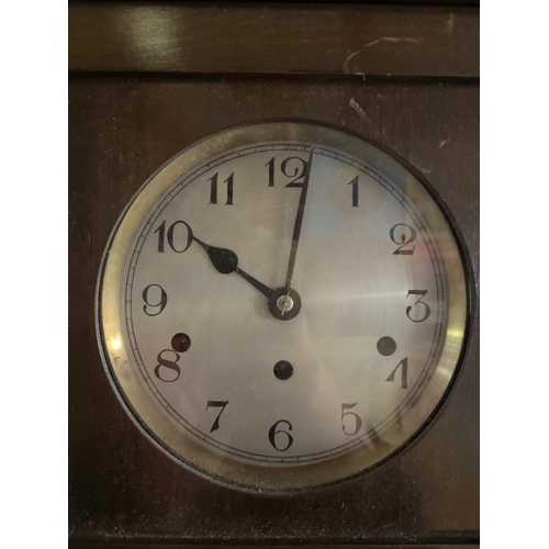 375 - A 1930's oak wall clock with bevel glass panels COLLECT  ONLY