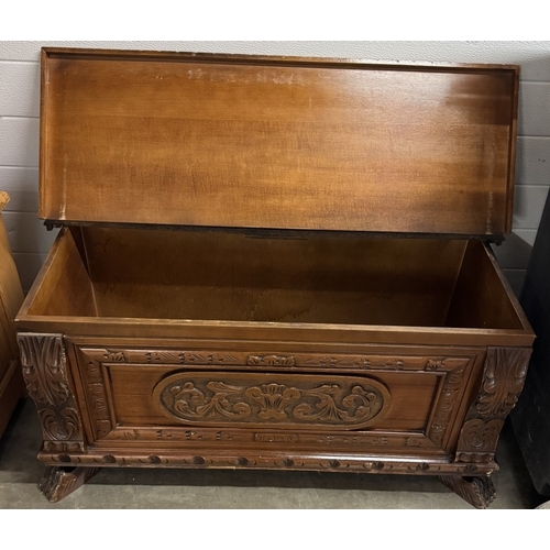 380 - A dark wood stained blanket box with carved frontage COLLECT ONLY