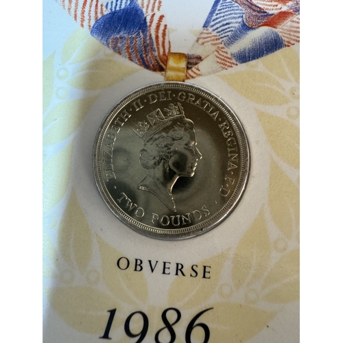 1200D - An interesting album of 20 coin covers & other coin sets including US $5 Pearl Harbour, UK Jubilee £... 