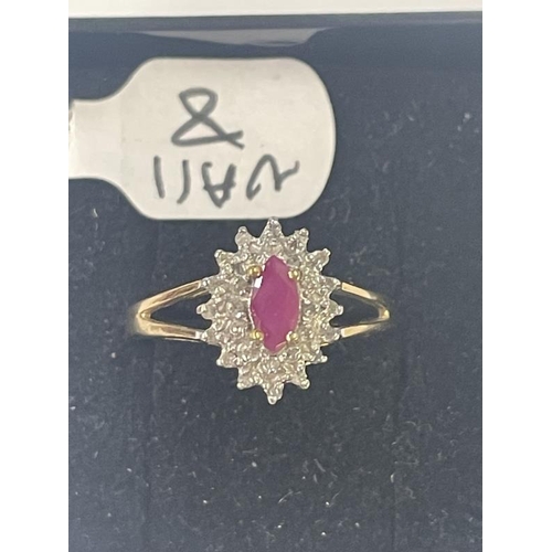 1005 - A yellow gold oval ruby and diamond ring, size L, 1.8 grams.