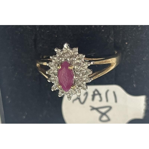 1005 - A yellow gold oval ruby and diamond ring, size L, 1.8 grams.