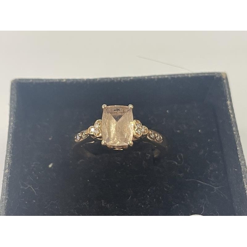 1008 - A 14ct yellow gold morganite and diamond ring, size M half, 2.7 grams.