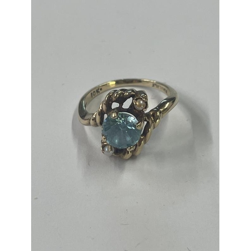 1010 - A 10ct yellow gold aqua and pearl ring, size L, 2.83 grams.