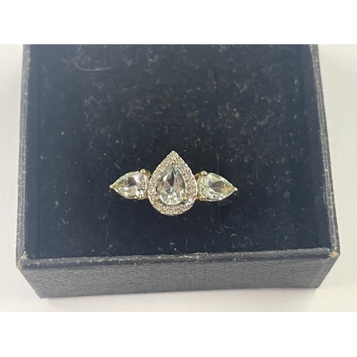 1012 - A pear shaped yellow gold topaz and diamond ring, size N, 2.4 grams.