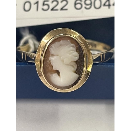 1014 - An 18ct gold ring set cameo, size U, 2.4 grams.