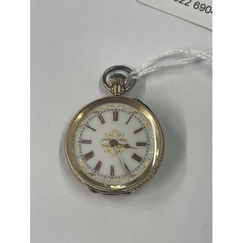 1018 - A 14ct gold cased ladies fob watch with enamelled dial, 34mm diameter, total weight 29 grams.