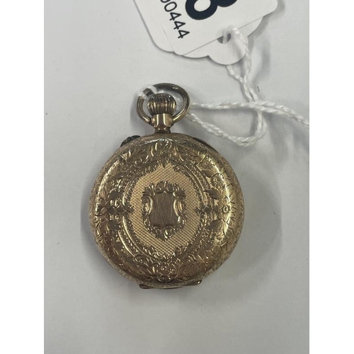 1018 - A 14ct gold cased ladies fob watch with enamelled dial, 34mm diameter, total weight 29 grams.